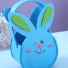 Comercio exterior al por mayor nuevo hecho a mano para niños de dibujos animados lindo cesto de Pascua bolso de mano de fieltro bocadillos decoración de regalo