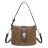 Bolso de mano estilo extranjero, bolso tipo cubo para mujer, nuevo bolso de hombro cruzado de moda transfronterizo Otoño 2026, bolso tote pequeño para salir