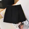 Nueva falda corta irregular con abertura para verano, pantalones casuales de traje de cintura alta talla grande, línea A adelgazante, nuevo estilo chino