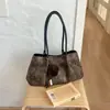 Bolsa Casual de Grande Capacidade 2026 Novo Estilo Versátil Bolsa de Ombro Único Popular Bolsa de Mão com Estampa de Leopardo Bolsa Tote Estilo Preguiçoso