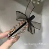 Pinzas para el cabello de pedrería brillante de lujo estilo coreano Dongdaemun Primavera 2026 para mujer, Colección de accesorios para el cabello de la frente