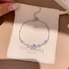 Pulsera de flor de circón chapada en oro real de 18k, diseño de nicho, simple y elegante, joyería de lujo ligero y sensación de alta gama
