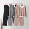 Conjunto de suéter de punto grueso de cable transfronterizo para mujer, otoño e invierno, cuello polo, punto de imitación de dos piezas combinado con pantalones de pierna ancha, conjunto de dos piezas