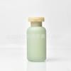 Botella dispensadora portátil para viaje de 100 ml Tipo pulsador Champú Gel de ducha Detergente para ropa Botella vacía de almacenamiento Juego