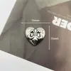 Nuevos Accesorios de Corazón Cruzado Joyería Personalizada Estilo Oscuro Parche de Aleación Hecho a Mano Accesorios para el Cabello Flores para Zapatos Materiales DIY