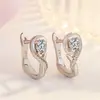 Temperamento coreano aretes de corazón de plata 925 aretes mujer chapados en platino simples de amor aretes venta al por mayor