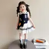 Vestido de Verão para Meninas 2026 Versão Coreana Desenho Animado Vestido Polo Regata Estilo College para Menininhas Vestido Plissado Infantil Estilo Tendência