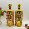 Venta al por mayor de fábrica botella de vino blanco de vidrio con patrón de dragón en relieve 1000 ml botella con baño de oro empaque de caja de regalo gran cantidad Congyou