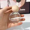 Botella dispensadora de perfume de alta gama 30 ml Botella pulverizadora 25 ml Portátil de vidrio con pulsador Botella vacía Elegante Viaje Pulverizador de niebla fina