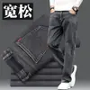 Jeans de alta gama en color gris ahumado para hombre, corte recto holgado, talla grande, pantalones de pierna ancha para hombre, nuevos pantalones casuales de otoño