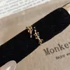 Arete de oreja de espiga de trigo morado con circón suave estilo francés, sensación de lujo ligero y alta gama, único, compacto, exquisito, accesorio de mano versátil