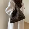 Bolso bolso de mujer bolso de gran capacidad sensación hobo para ir al trabajo estampado de leopardo nuevo elegante tote 2026 retro un solo hombro
