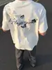Camiseta de Manga Corta con Estampado Floral Estilo High Street Americano para Hombre 2026 Nueva Marca Moderna de Verano Holgada Estilo Retro Pareja Top
