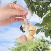 Estilo Bosque Curación Natural Cáscara de Fruta Carrillón de Viento Colgante DIY Hecho a Mano Semilla Sonajero Manual Carrillón de Viento de Cáscara de Fruta Adorno Bolsa Encanto
