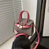 Bolsa para Niños 2024 Nueva Moda Europea y Americana Patrón de Lichi Mini Bolso Kelly Niñas Bolso Cruzado de Color Contrastante Bolso Rojo para Mujer