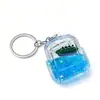 Série Oceano Criativo Pequeno Barco Mochila Chaveiro Acrílico Preenchido com Óleo Areia Movediça Garrafa Flutuante Alívio de Estresse Ampulheta Ornamento