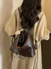 Bolso de Hombro Único de Alta Gama Transfronterizo 2026 Nuevo Color Sólido Simple Moda Versátil Chic Moderno Mochila para Viajes de Negocios