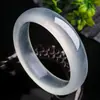 Venta al por mayor de fábrica pulsera de seda de hielo jade envuelta pulsera de espuma de agua de hielo blanca para mujer pulsera de jade luz de luna blanca para niña alta transparencia