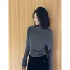 ¡Llegó! Nuevo diseño de invierno, estilo nicho, cuello medio alto, cuello con volantes, suéter de punto, top de punto interior para mujer, otoño