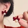 Pendientes Retro de Terciopelo Rojo con Flor para Mujer Otoño e Invierno 2025 Nuevos de Moda Lujo Accesible Pendientes de Lazo de Gama Alta