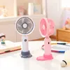 2026 Nuevo Producto Ventilador de Mano Simple Portátil Pequeño Carga USB Base Soporte para Teléfono Ventilador de Escritorio