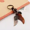 Joyería de moda de alta venta transfronteriza, Colgantes de pluma de aleación creativos y personalizados, Anillos redondos, Etiquetas con letras en inglés, Joyería de cuero tejida