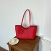 Bolso tejido de nicho transfronterizo para mujer, nuevo bolso de moda para hombro y axila, bolso tote versátil para el trabajo y uso diario