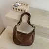 Bolso de mujer de gran capacidad, nueva colección primavera/verano 2026, diseño de nicho, bolso de hombro, bolso cruzado, textura de alta gama, bolso con forma de bollo