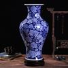 Jingdezhen Pintado à Mão Fundo Azul Água Misto Peônia Garrafa Cerâmica Novo Estilo Chinês Sala de Estar Artesanato Doméstico Moldura Antiga Ornamentos