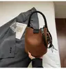 Bolso de Cubo Retro Casual de Mano para Mujer 2026 Nuevo Estilo de Gama Alta Elegante Versátil Bolso de Hombro Cruzado de Gamuza