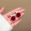 Pendientes rojos de Año Nuevo para mujer, otoño e invierno, con lazo, con clip para las orejas, nuevos pendientes de perla de Año Nuevo 2024