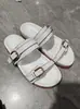 Zapatillas Gruesas de Suela Metálica con Hebilla Grande Transfronterizas para Mujer 25 Verano Nuevas Sandalias Casuales al Aire Libre Europeas y Americanas Calzado de Mujer