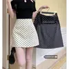 Colección Primavera 2026 para Mujer de Dongdaemun: Falda Midi de Lunares, Versátil Falda de Traje de Línea A de Cintura Alta para el Trabajo