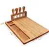 En stock tabla de quesos de bambú tabla de cortar quesos juego de cuchillos cuatro en uno tabla de cortar para cocina doméstica estilo transfronterizo de Amazon