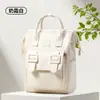 Bolsa de mamãe para mães e bebês, uma nova bolsa de armazenamento leve de grande capacidade para sair, mochila multifuncional de alta aparência
