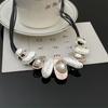 Gargantilla de cuero multicapa con cadena de clavícula ovalada irregular de alta calidad europea y americana, con personalidad exagerada para mujer, collar de moda