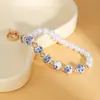 Chaveiro de Flor com Gotejamento de Óleo Estilo Europeu e Americano para Mulheres, Elegante e Moderno, com Pingente de Pérola em Forma de Borboleta e Coração, Acessório para Bolsa