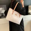 2026 Elegante Verano Nuevo de Moda Personalizado Moda para Viajar Simple Gran Capacidad Bolso Tote de Hombro Único para Mujer al por Mayor