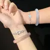 Pulsera de Hello Kitty, estilo nuevo, diseño hueco, linda e inocente. Pulseras incrustadas exquisitas y de alta gama al por mayor.