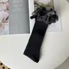 Calcetines de encaje Lolita, calcetines nuevos de otoño e invierno de color liso con lazo de encaje hasta la mitad de la pantorrilla, calcetines de encaje con lazo para la pantorrilla