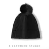Gorros de punto con pompón al por mayor 2022 nuevo estilo japonés simples versátiles para estudiantes gorros de lana cálidos gorros tipo pullover con forro polar para mujer