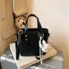 Bolso Cubo Nuevo de Primavera 2026 con Relieve para Mujer, Bolso de Hombro Cruzado Versátil de Moda, Bolso de Mano Casual Simple Exquisito