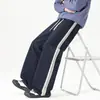 Pantalones Casuales Rectos de Patchwork a Rayas de Calle Americanos Nuevos Otoño/Invierno 2026 para Hombre, Pantalones Casuales Sueltos de Pierna Ancha de Moda