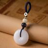 Llavero con colgante de coche con botón de la paz de oro y jade creativo, joyería de jade creativa personalizada, regalo de alta gama para hombres y mujeres.