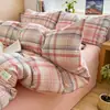 Juego de ropa de cama de cuatro piezas de algodón lavado ultrasuave clase A estilo minimalista, nueva funda de edredón y sábana de estilo Muji, juego de tres piezas para dormitorio 4