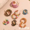 Moda Europea y Americana Nicho Elegantes Pendientes de Gota de Aceite Acero Inoxidable Chapado en Oro de 18K Color Caramelo Rueda Forma de C Pendientes de Malla para Mujeres