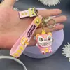 Estilo Chino Danza del León Gato de la Suerte Llavero Silicona Colgante para Bolso de Coche Adorno del Año de la Serpiente Mascota de la Suerte Fabricante Venta al por Mayor