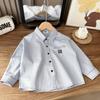 Ropa para niños primavera 2024 camisa de algodón suave lavado estilo coreano holgada de manga larga venta al por mayor entrega