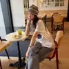 Camiseta Casual Versátil Estilo Coreano Estampada de Nicho Manga Corta Verano Ropa para Mujer 2026 Nuevo Estilo Holgada Adelgazante Cuello Redondo Top