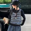 Camiseta a rayas de dos piezas de imitación para niñas transfronterizas, nueva colección de otoño 2026, top de manga larga de algodón puro para niños mayores, moderno